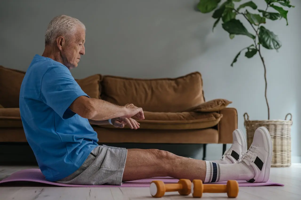 An elderly man doing exercise