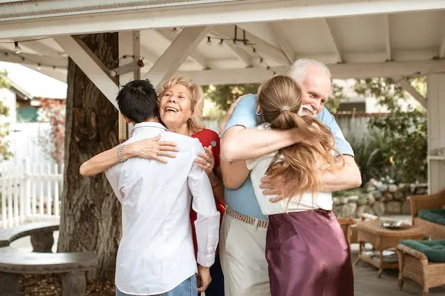 Couple with their elderly parents