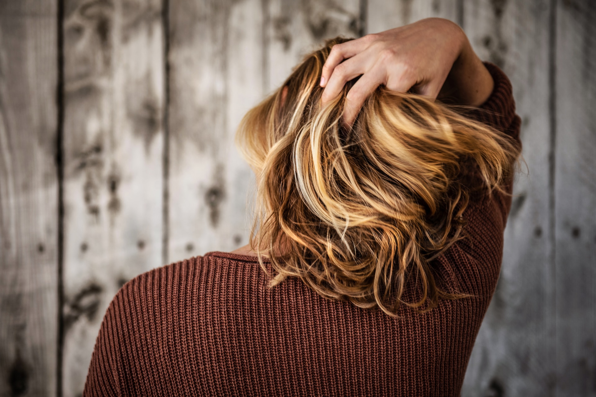 A girl touching her hair