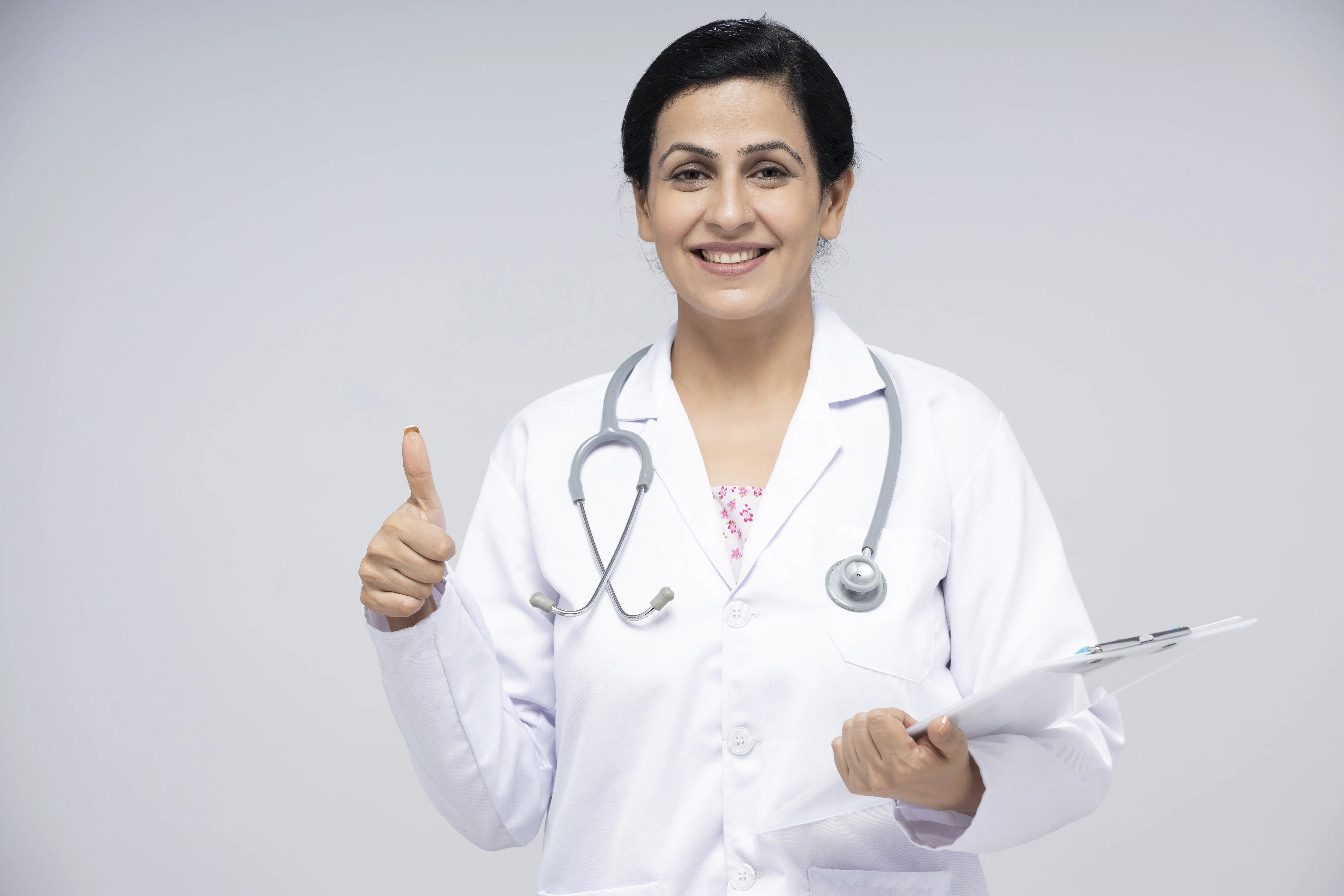 Doctor waving on a video call